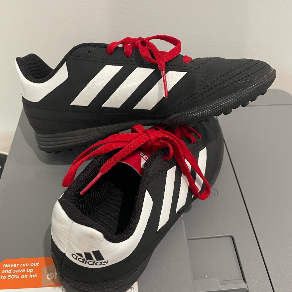 adidas Originals Kids indoor soccer cleats. Black and White with Red Laces